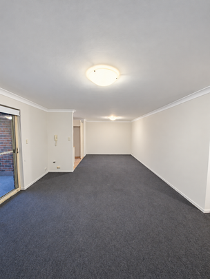 Spacious Two-Bedroom Apartment with Balcony & Two Car Spaces - Photo 1
