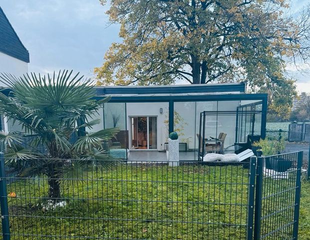 Traumhafte Bungalow-Wohnung mit Wintergarten, Garten & Klima - Photo 1