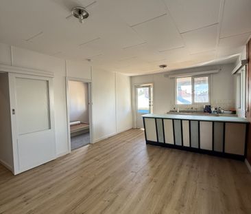 Low maintenance living in prime location! - Photo 5