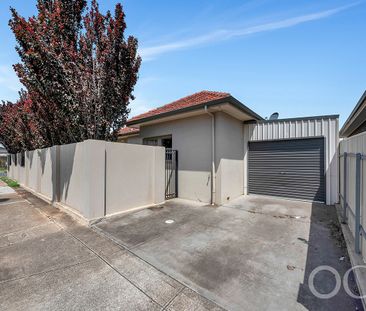 Open the Door to Style, Security, and Location in Woodville South - Photo 4