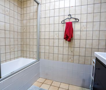 Leuke rijwoning met zij-ingang naar grote tuin - Photo 6