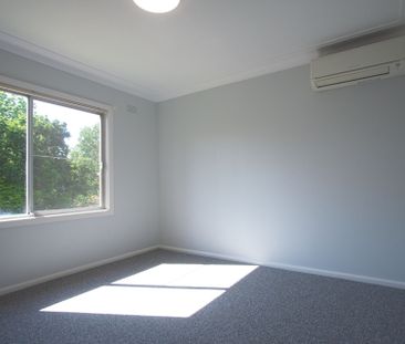 Cosy 3 bedroom unit with water and lawns mowing included - Photo 1