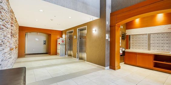 Two Bed, Two Bath Condo with Two Side by Side Parking Spaces and Storage in Walnut Grove Langley - Photo 3