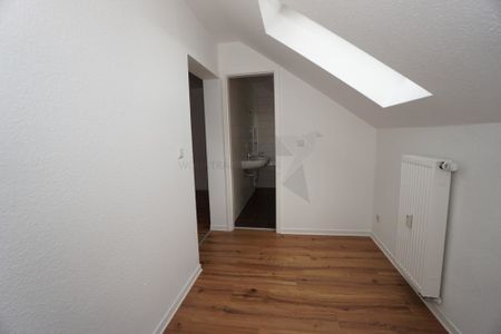 Gemütliche 4-Raum-Wohnung mit Dachterrasse! - Photo 2