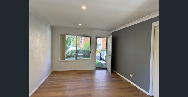 Updated Townhouse in Excellent Location - Photo 1