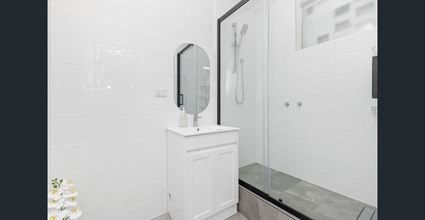 Sunlit Bayside Gem in a Prime Lifestyle Pocket! - Photo 1