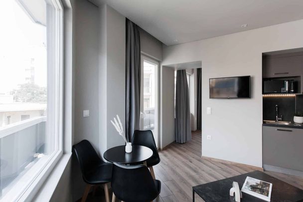 Bright 1BR Apartment at WYZ Athens - Photo 1