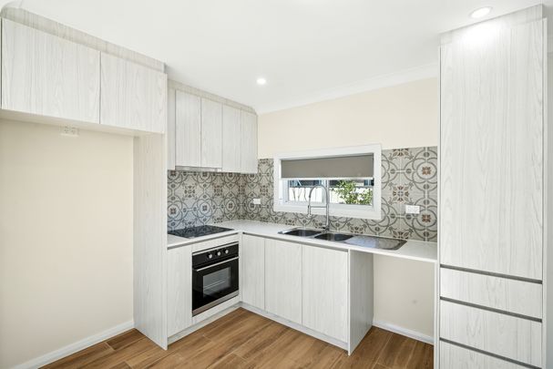 BRAND NEW TWO BEDROOM GRANNY FLAT WATER INCLUDED - Photo 1