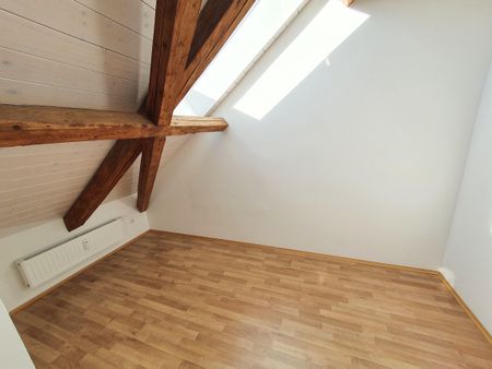 Geförderte 2-Zimmer-Wohnung im Dachgeschoss - 57,80m² - Photo 2