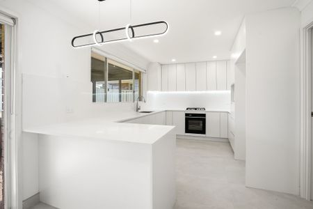 Beautifully Renovated Four Bedroom Family Home - Photo 4