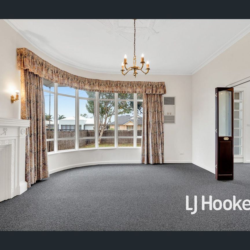 UPDATED 3 BR HOME WITH HUGE RUMPUS ROOM, & HEAT & COOL! - Photo 1