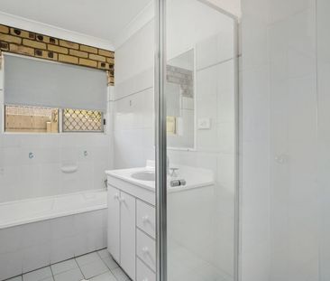 FOUR BEDROOM LOW SET BRICK WITH SIDE ACCESS AND ROOM FOR BOAT OR CA... - Photo 2