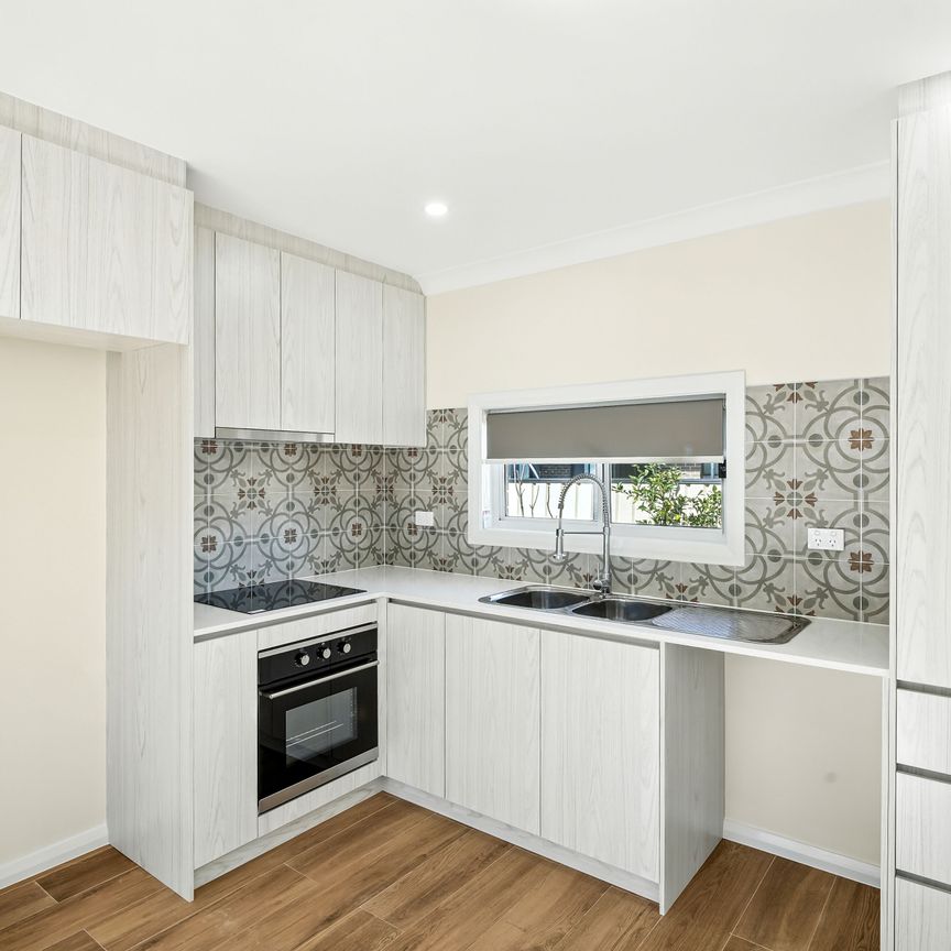 BRAND NEW TWO BEDROOM GRANNY FLAT WATER INCLUDED - Photo 1