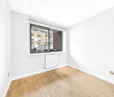 A recently redecorated mid-terrace townhouse, on this quiet road in... - Photo 6