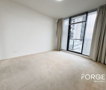 Modern 12th Floor Sanctuary with Dual Balconies & Floorboards - Photo 3