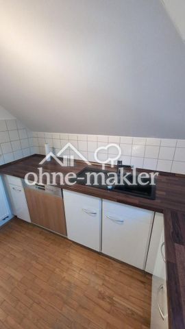 Sonnige 3-Zimmer DG-Wohnung mit tollem Blick auf die Berge mit EBK und Gartennutzung! - Photo 4