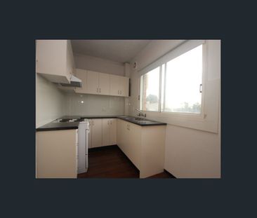 Well Presented Two Bedroom Apartment with Lock up Garage - Photo 1