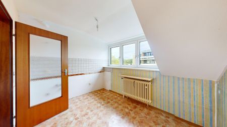 IMMOPARTNER - 3-Zimmer-Dachgeschosswohnung mit Balkon und Garage - Foto 2