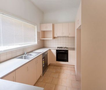 This beautifully presented, spacious three-bedroom home is ideally ... - Photo 6