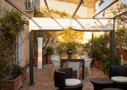 Attic-Monti: 1-6 month rentals. Spacious, furnished 3 Bedroom, 2 bath, living room, dining room, study and large panoramic terrace. Bright, silent, located in well kept Palazzo d’Epoca with elevator and doorman. Near transport and Metro.