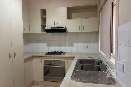 PERFECTLY LOCATED TOWNHOUSE WITH 2 FAMILY AREAS - Photo 3