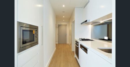 Rhodes Central 1 bed east facing with city & water views - Photo 3