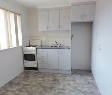 Tidy one bedroom unit with Lock up garage - Photo 2