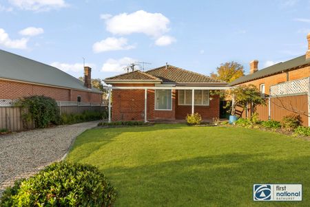 Charming CBD Cottage with Character & Sunlit Living - Photo 3