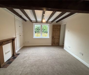 A 2 bedroom terraced cottage with a double garage and off-street pa... - Photo 2