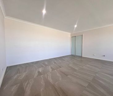 NEAR NEW 4 BEDROOM HOME - Photo 5