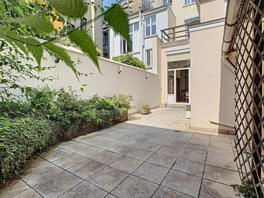 Rez-de-Chaussée 1 chambre avec cour - Photo 1