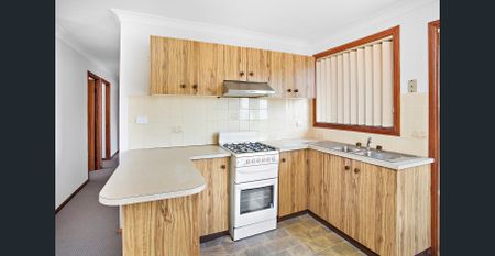 Neat and Tidy Two-Bedroom Villa - Photo 3