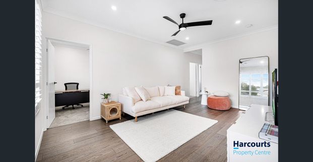 Near New Family Home with a Smart Design and Two Large Living Areas - Photo 1