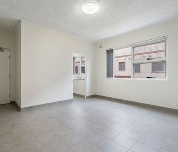 RENOVATED 2 BEDROOM UNITS WITH CAR SPACE - Photo 4