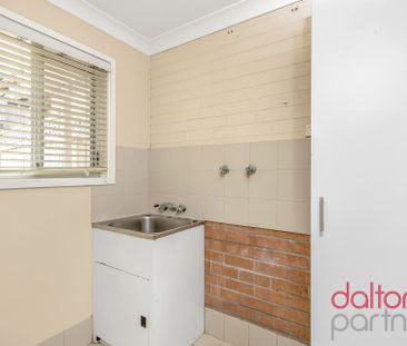 Three Bedroom Townhouse in Perfect Location! - Photo 2