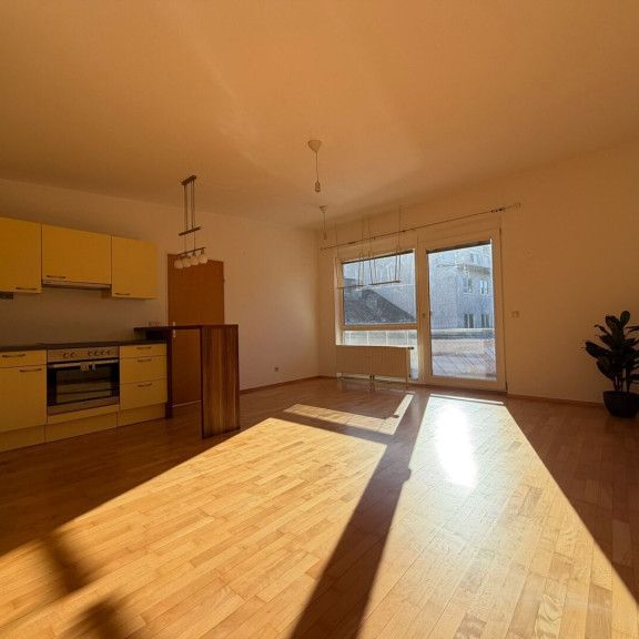 Urban wohnen mit Außenfläche – 2 Zimmer direkt am Hauptplatz - Foto 1