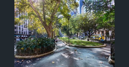 Large Updated Two Bedroom | Furnished - Photo 2