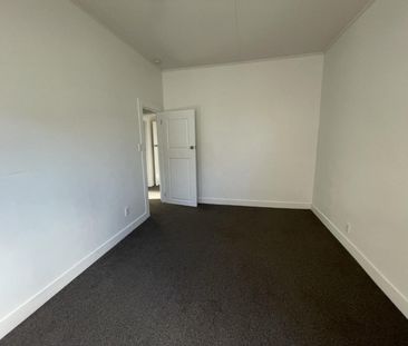 Updated three-bedroom home - Photo 6