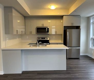 102-1585 Rose Way - Photo 1