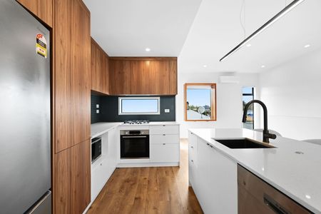 Discover the perfect blend of design, space, and location in this stunning three-bedroom, two-bathroom home over two levels on Victoria Street. - Photo 5