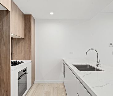 Luxury Living at the Archibald – Stunning Water & District Views - Photo 5