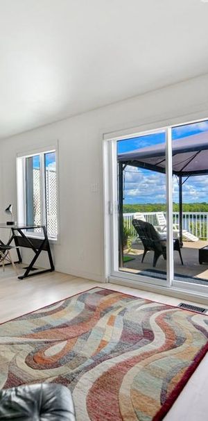 Maison en rangé à louer aux abords de la rivière des Prairies à Laval - Photo 1