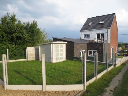 Gelijkvloers appartement met staanplaats, terras en tuin. - Photo 2