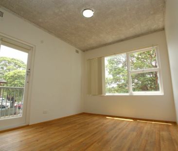 Modern 2 Bedroom Unit in a quiet location - Photo 2
