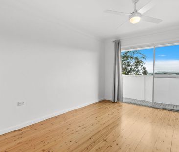 Spacious Modern Living with Beautiful Lake Views - Photo 2