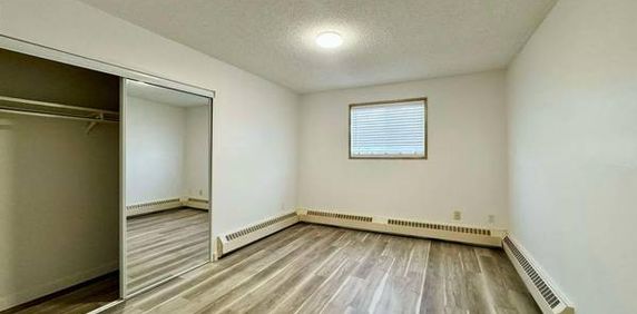 GREAT 1 BED, 1 BATH MAIN FLOOR CONDO W/AN OUTSIDE PARKING STALL IN MIL - Photo 2