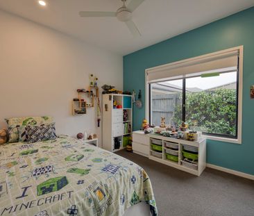 Stylish Four-Bedroom Home With Poolside Living - Photo 6