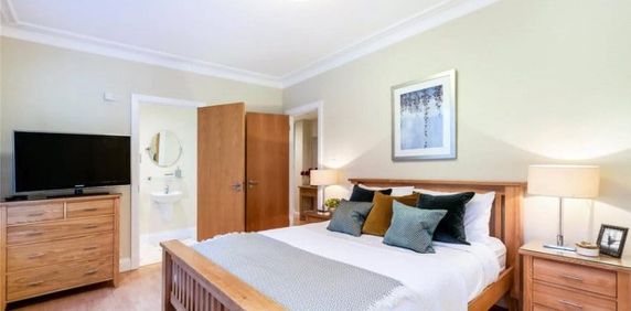 A two bedroom apartment of approximately 1,281 square feet. - Photo 2