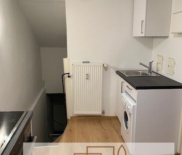 1-Zimmer-Mansarden-Einliegerwohnung in einem Reiheneckhaus - Ensemb... - Foto 4