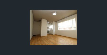 Modern 2 Bedroom Unit in a quiet location - Photo 2